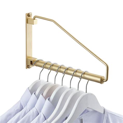 clothes hanging wall mount|wall mounted folding clothes hanger.